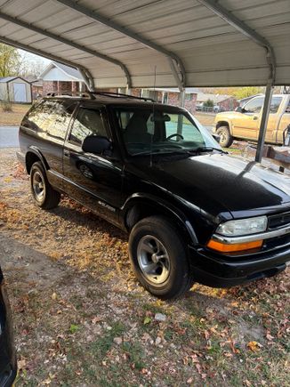 Just got this 01 Blazer. Really nice but does have some things I want to fix. It has some poor rust repair in front of the rear tires, blower motor resistor is bad, hood popped up and broke windshield on previous owner. I plan on replacing the hood this winter and painting it. 

The original owner passed and his brother got it. He drove it very little but did not keep up on maintenance on it. This will be one of my winter projects and want to do a mini restore on. Forums have tons of information