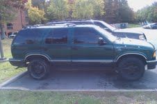 painted whole bottom black with multi-flake to give it a color changing flop when the sun hits it, back tire is a spare which I also painted black