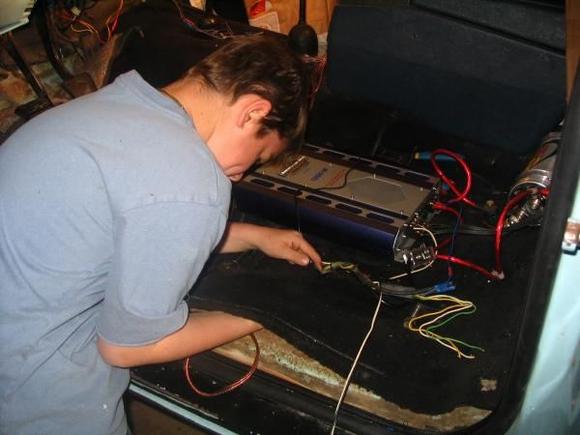 my son at 11 years old wiring my sound system
