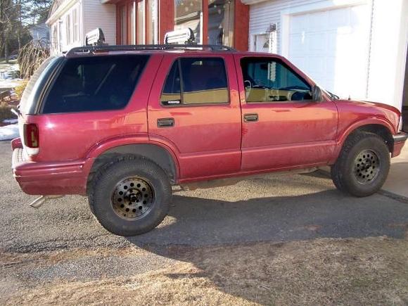 Photoshop... tinted windows, blacked out tail lights, and black wheels... yes or no?