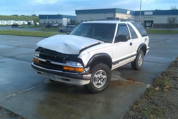 slide thru a light on a very rainy night, ran into a BRAND NEW dodge 1 ton (3500) megacab diesel! it had only 2k and was valued at 65k! damn, go big or go home. plus the mega cab was also considered totaled, lol
