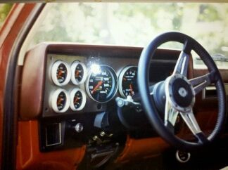Full Autometer dash:  Monster tach, Monster speedo, volt meter, gas, water temp, trans. temp, vacuum, oil temp