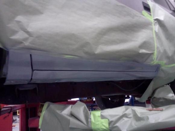 Sanded and primered the rocker and bottom of the door to stop the rust untill I can get it in the paint booth