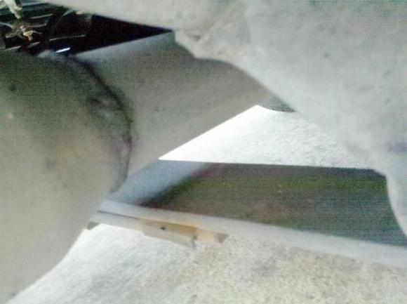 Another picture of my old rear exit exhaust coming out before the rear right tire.