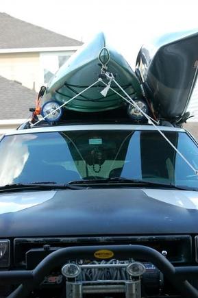 minor mods made to get both yak's on with out hitting the lights.  Will invest in larger, heavier rack in the future!!!