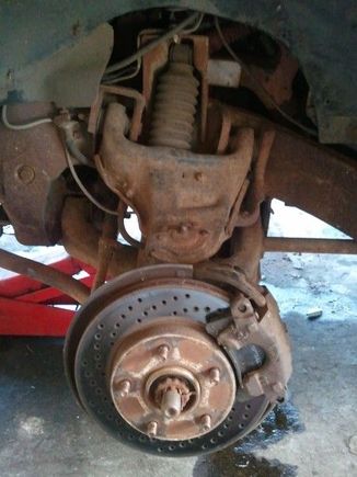 Front drilled rotors and doing some suspension mantainance