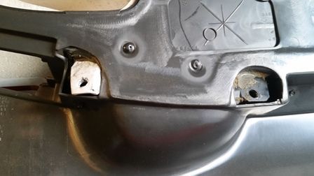 This is how the handle looks from inside the door panel after the handle is mounted to the door panel.