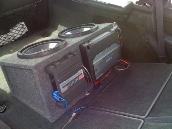 One Kenwood 350wat amp to run door and dash speakers one 1500wat amp for two Kenwood subwoofers and a 7.3 Capacitor.