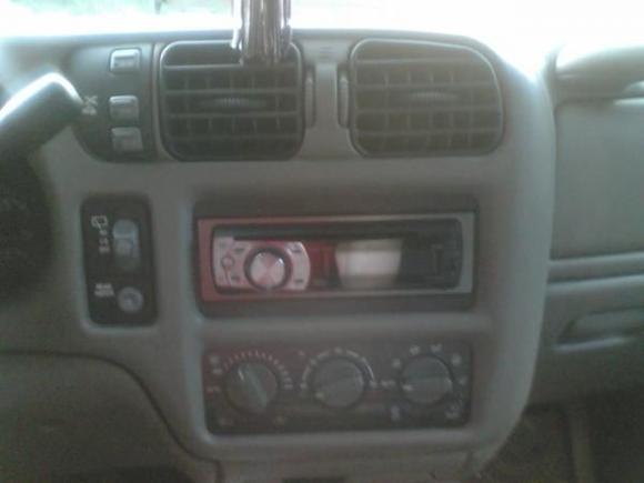 Black A/C vents and 4x4 switch. Pioneer CD player.