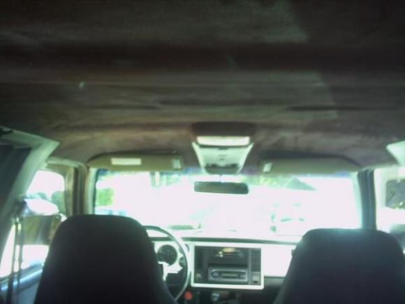 custom microfiber headliner with chevy logo in the center