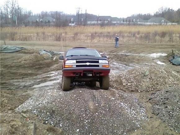 Climbing a hill behind Home Depot.  Before the brush guard