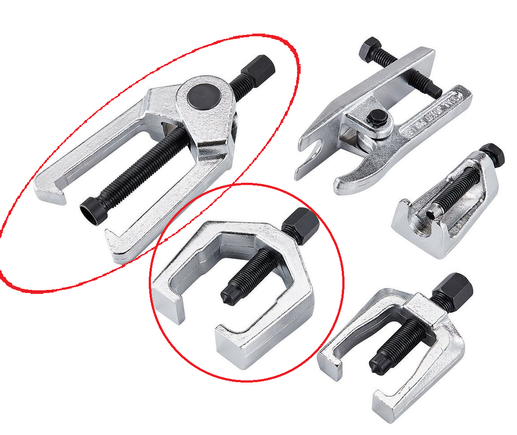 The tools used to disconnect the pitman arm from the centerlink (upper left) and to disconnect the pitman arm from the steering gear (center bottom)