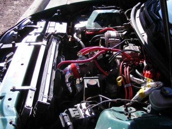 3" twin intake, aluminum brackets bent to hold radiator forward and in place.
