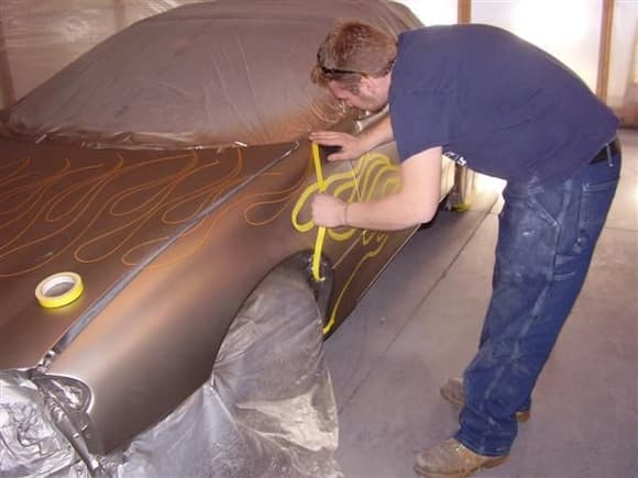 Paint is on and starting the flame taping.  This is Matt Harmon of Harmon Custom Paint in Portland ME doing the work.  If your in need of excelent custom work and anywhere nearby I HIGHLY recommend his shop.