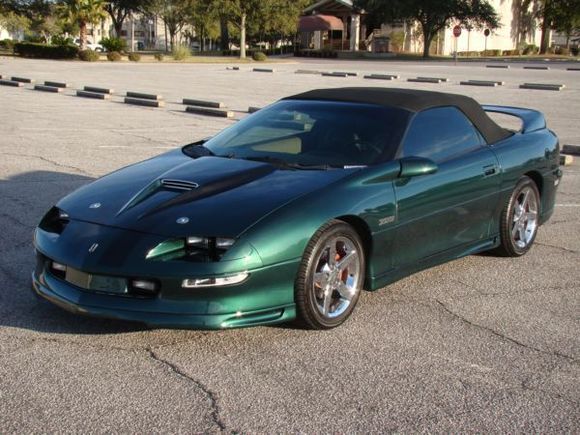 My 95 Z28 convert. six speed. Mods include: Delteq coil pack, BMR strut tower brace, Lower control arms, chrome moly panhard bar, lowering springs, energy suspension motor mounts, trans mount, torque arm mount, ported/polished stock MAF, SS hoold/SLP ram air box, BBK headers/magnaflow HF cat/flowmaster muffer, custom interior, custom stereo/250 amp alternator, custom paint, corvette 17X9.5 rims.