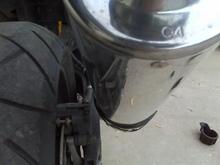 rear view, swing arm will hit bottom of canister through normal riding