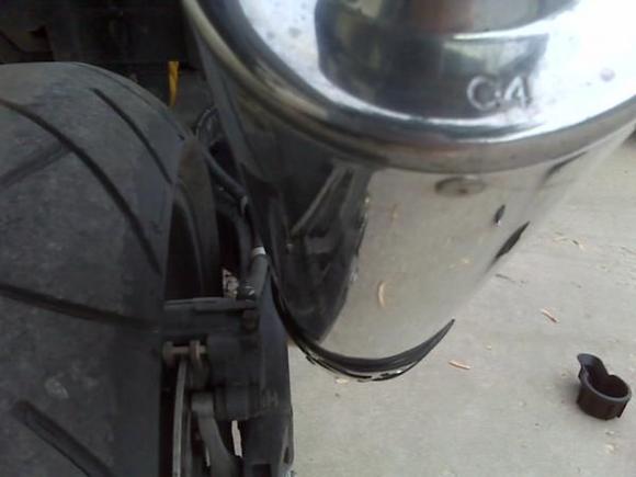 rear view, swing arm will hit bottom of canister through normal riding