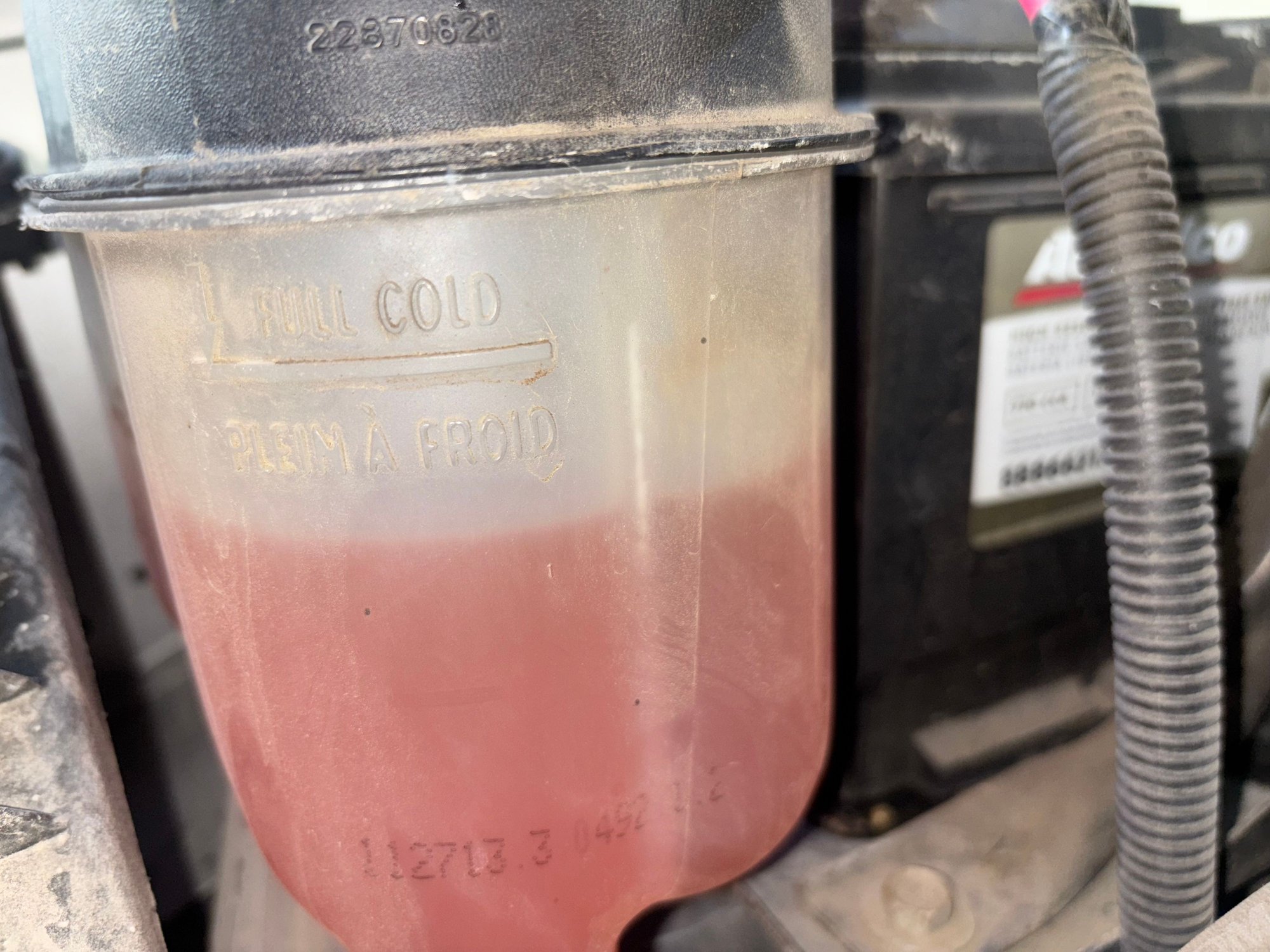 This photo was taken on a cold engine, after going for a drive to the shop and back which is 4 miles in total. And I topped it off before leaving. 