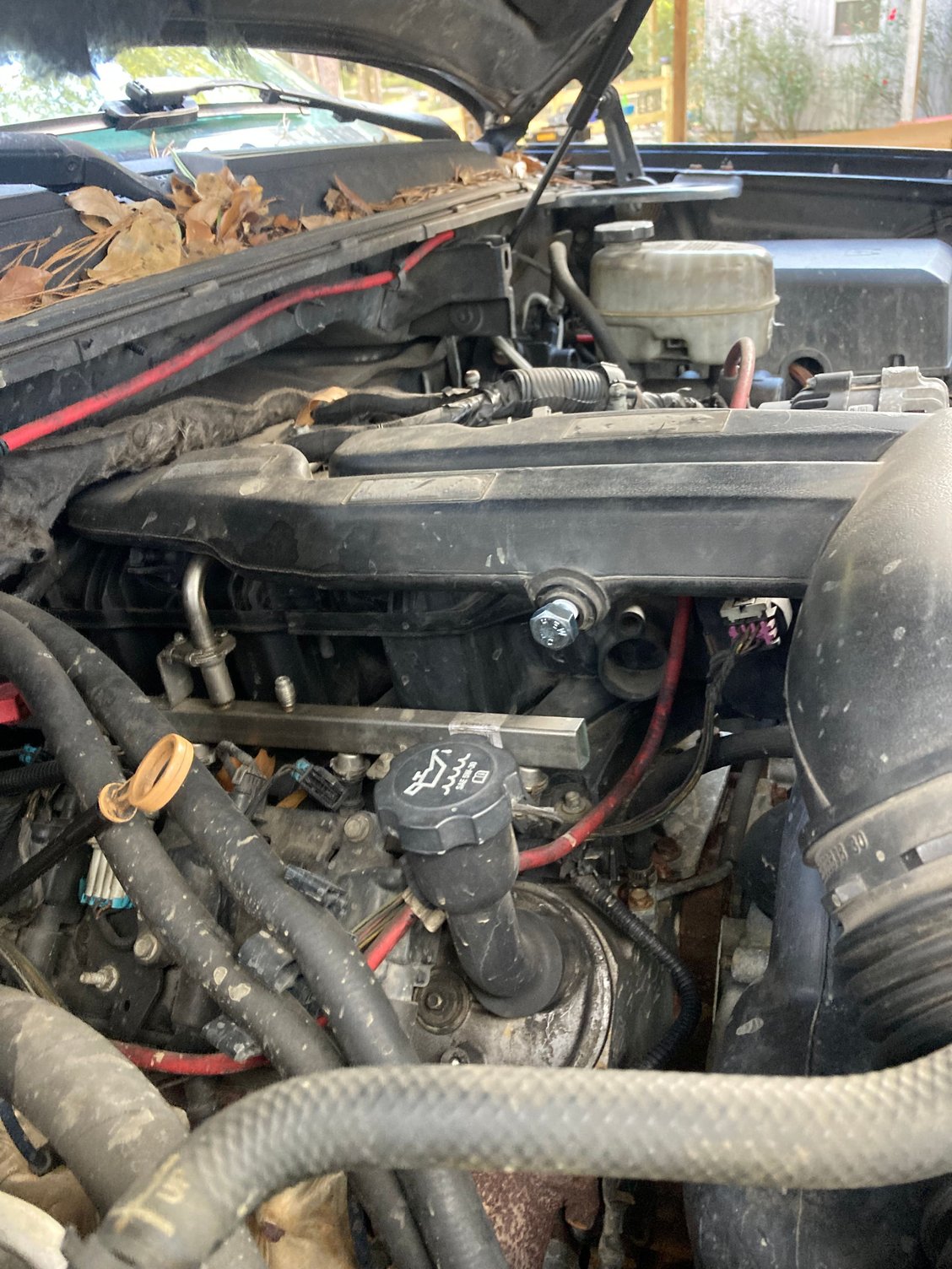 I plugged the hole in air box housing above intake manifold with a nut in picture above. Does anyone know where this hose is supposed to go or what it�s called so I can get a replacement? I can�t find it anywhere on the internet 