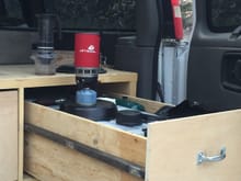 Chevy Van - Drawers riding on Skate Board Wheel Bearings.- deck used with foam for bed.