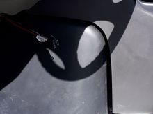 The center console needed that extra length on top to fit the longer/deeper engine cover. 