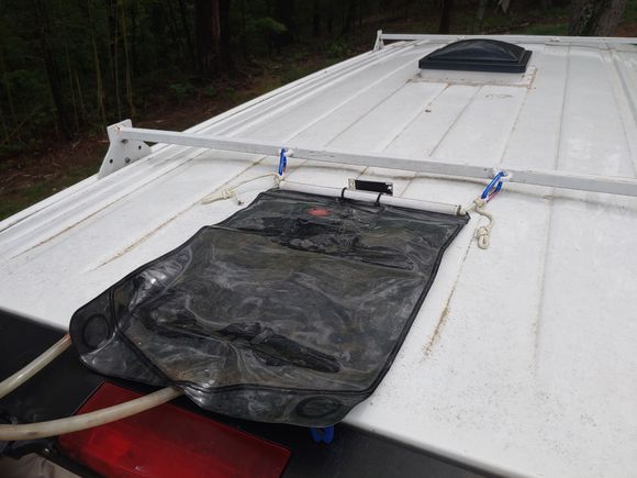 I have a propane water heater but rarely use it - this "solar bag" rides on the roof and is usually all I need