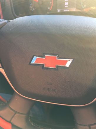 Interior steering wheel bow tie color change