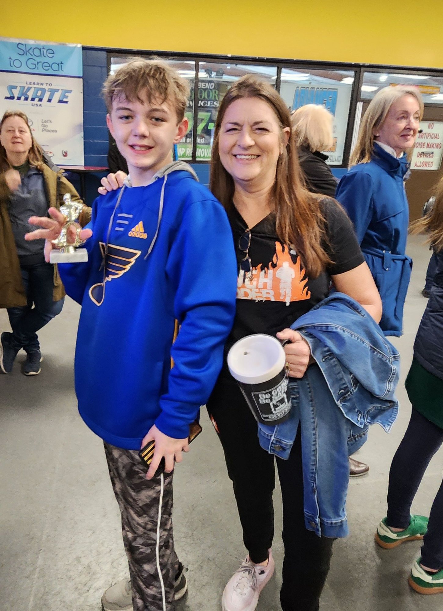 Gabe with Dawn and his Tournament MVP trophy
