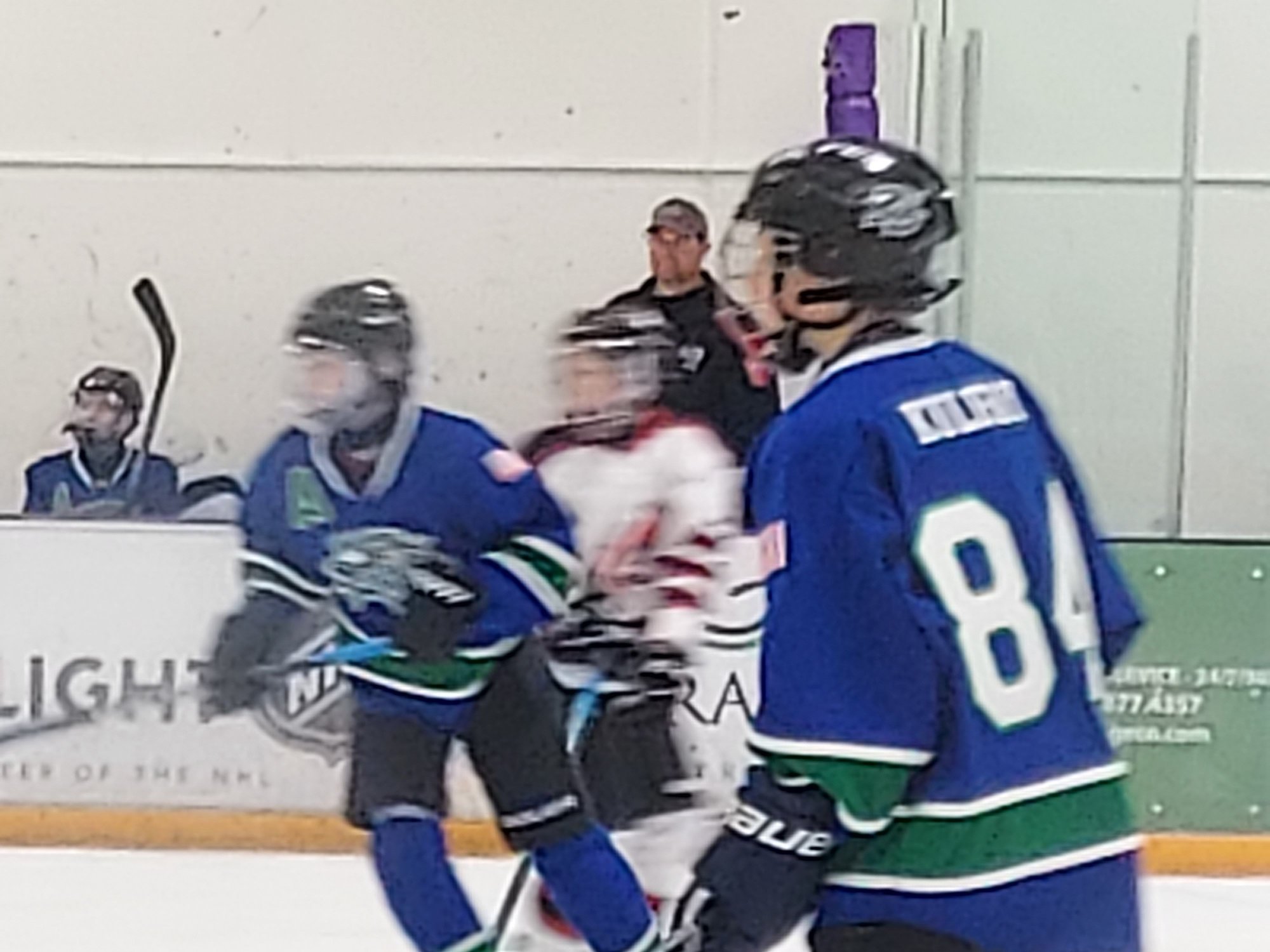 Blue jersey on the left.