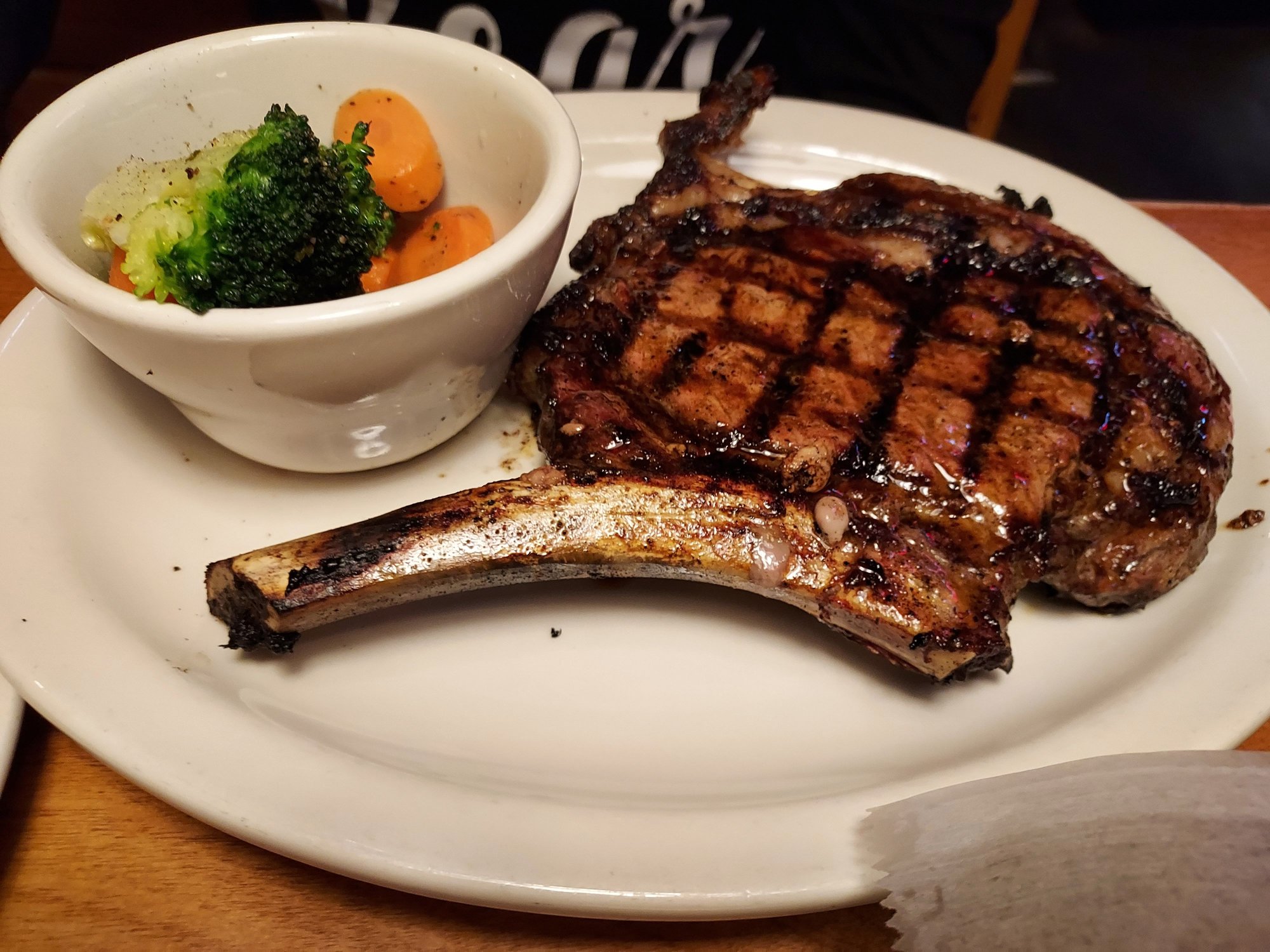 Dawn had a Caesar Salad, steamed broccoli and carrots , their 20oz. Bone-In Sirloin, and about 3 of their bottomless dinner rolls with honey butter.