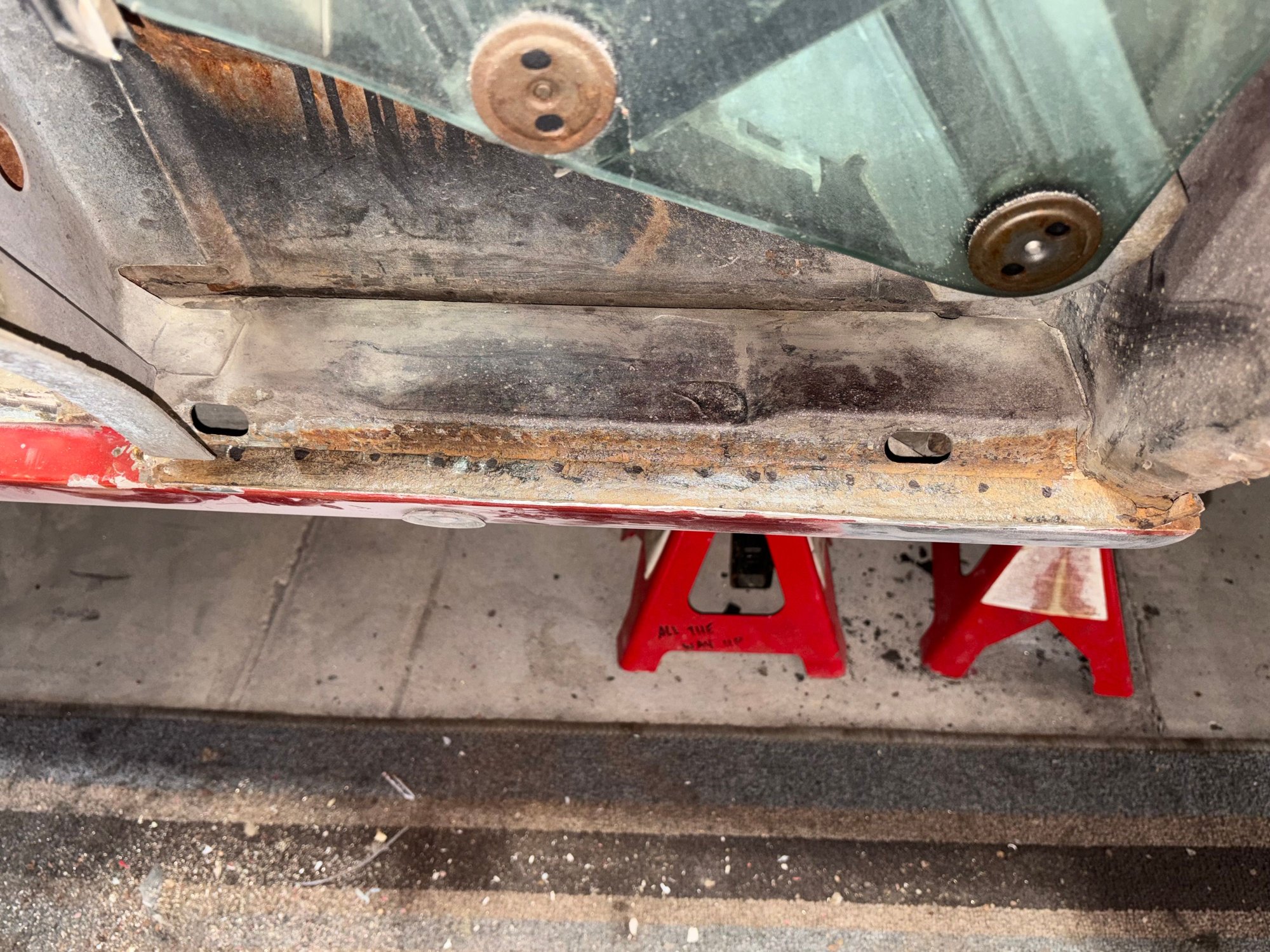 Marked out the spot welds and ground them out with the air file.