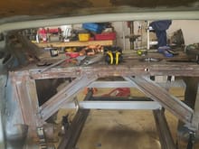 this is within a 1/4 inch of the outer roof skin and as far out as the rear window regulators will allow.  I primed it with a weld through primer because im not sure how long before the outer skin is removed, and i would like to minimize rust between layers. 