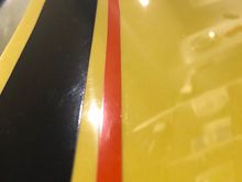 Original stripes on my car - separate, color all the way through. Smooth finish. 