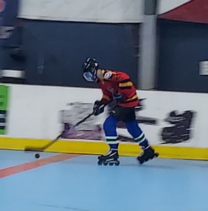 Gabe on the move during his 1st Roller Hockey game yesterday.