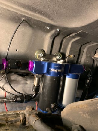 Magnafuel pump mounted in front of gas tank above differential