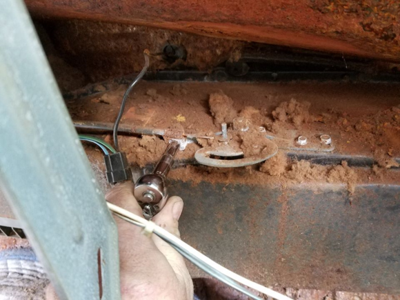 removing the heater control cables at the heater box. a 1//4 inch screw and a slide on locking washer need be removed. I find just take pliers and squeeze the washer. This makes it come right off and in if reinstalling you will need no washers.