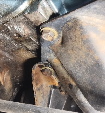 Elongated these bolt holes, added a couple washers,