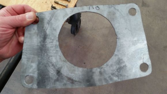 Fabricated plate between trans and bell