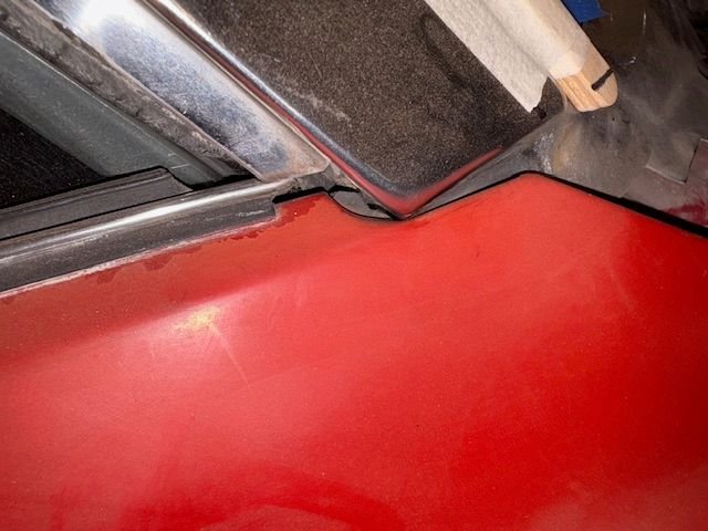 Front of door at window pillar is nearly touching the chrome trim