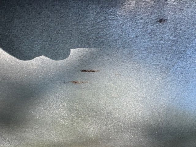 Lots of places like this.  Rust below surface that sanding won’t get to.   Lasting will.  Gotta get all the rust out if new paint is expected to last.