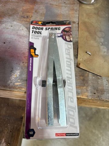 Got this at Advance Auto for $15.  Made of mild steel.  Should have been a high carbon steel, as it was not a match for the compressed power of the spring.