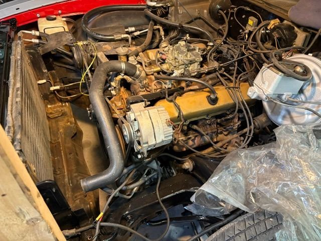 Pulling the carb will open up the intake manifold a bunch.