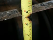 Measuring oil pan depth for setting the pick up tube. 8.75"