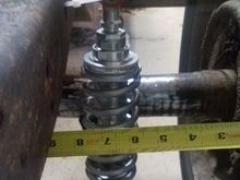 I have over 5 inches of clearance, with 7 inch wheels. This is actually one of the front shocks. 