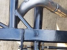 The upper shock mount needs to be almost exactly where the tab on the left needs to be. Im an idiot. I didnt account for the spacers needed to clear the axle tubes. 