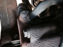What is this roached hose coming off my header???