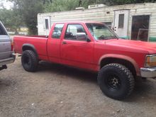 AFTER 31s torsion bars cranked up and some fender trimmimg. Rims are 4.00" backspacing with a 1.5" spacer.  They stick way out