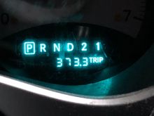 I got 373.3 miles on one tank of gas.  I did drive about 30 miles or more with the low gas light on.