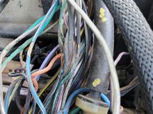 It looks like half the wire bundle has thier plastic jackets molded to gether. Besides the bare wires?