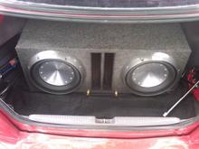Rockford Fosgate Power T1 12s W/ JBL Amp for mids and highs.